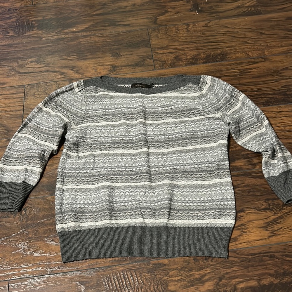 The limited 3/4 length sleeve sweater